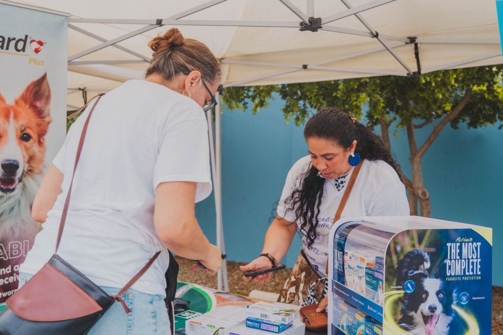 Pet care information stand at the Animal Care Clinic Aruba Fun Walk